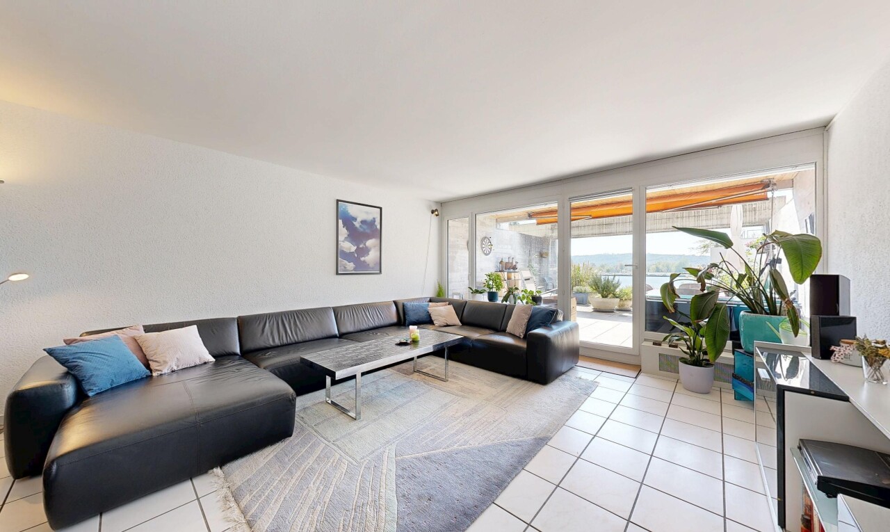 living room with light tile patterned floors