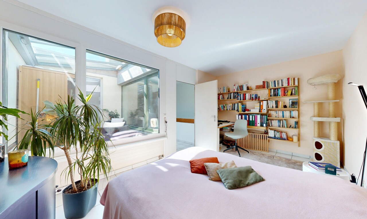 room / bedroom featuring an office area