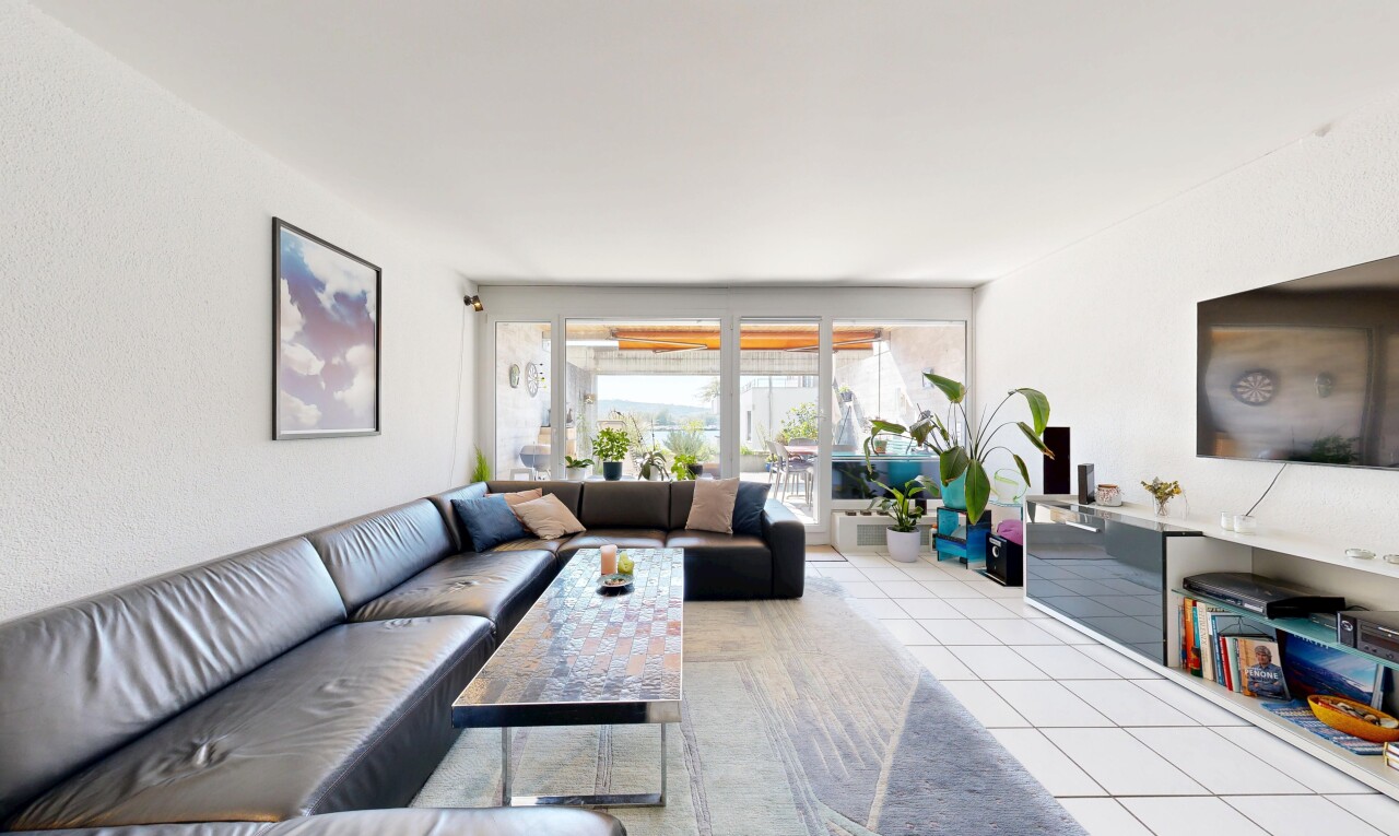 living room featuring light tile patterned flooring