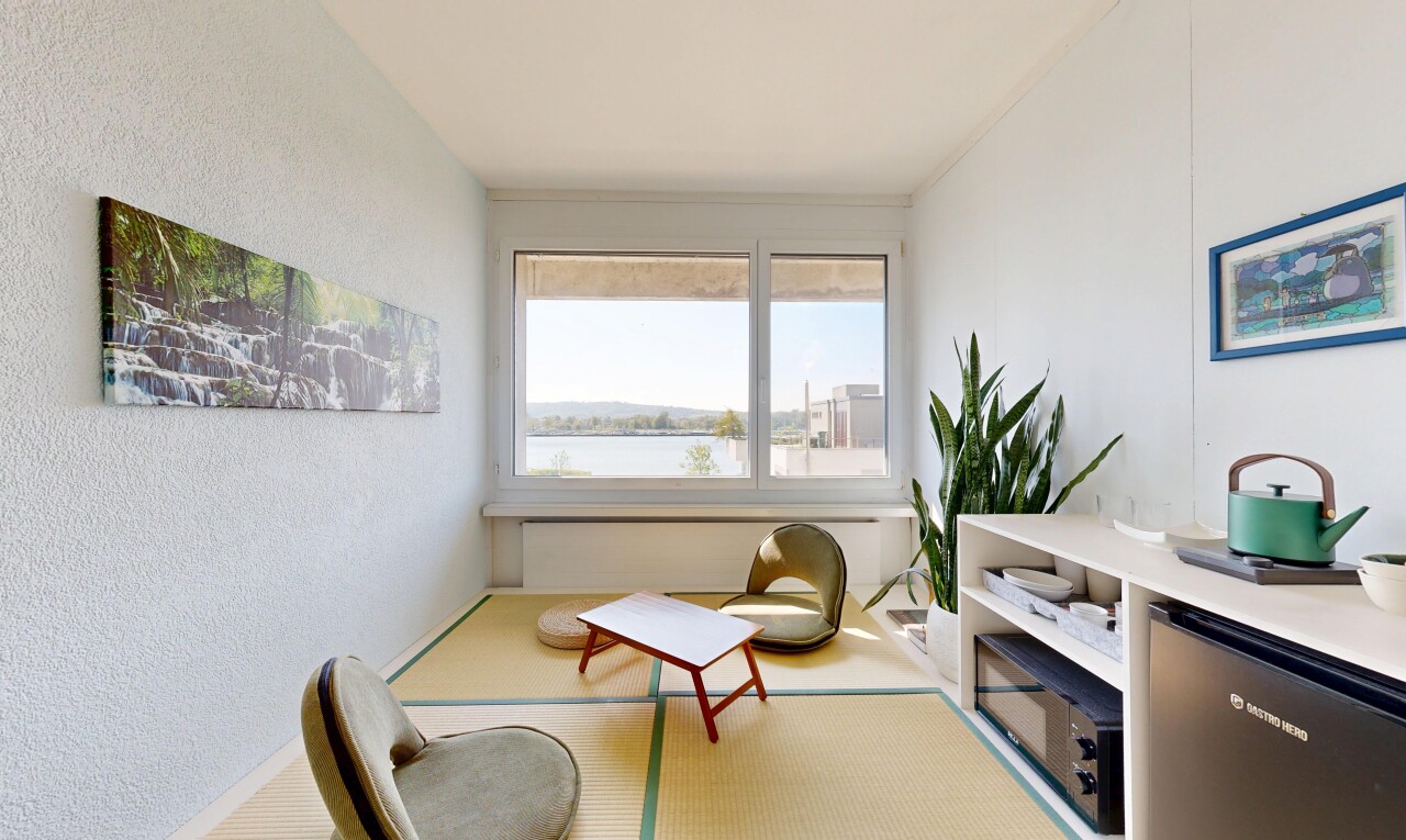 living room featuring a textured wall