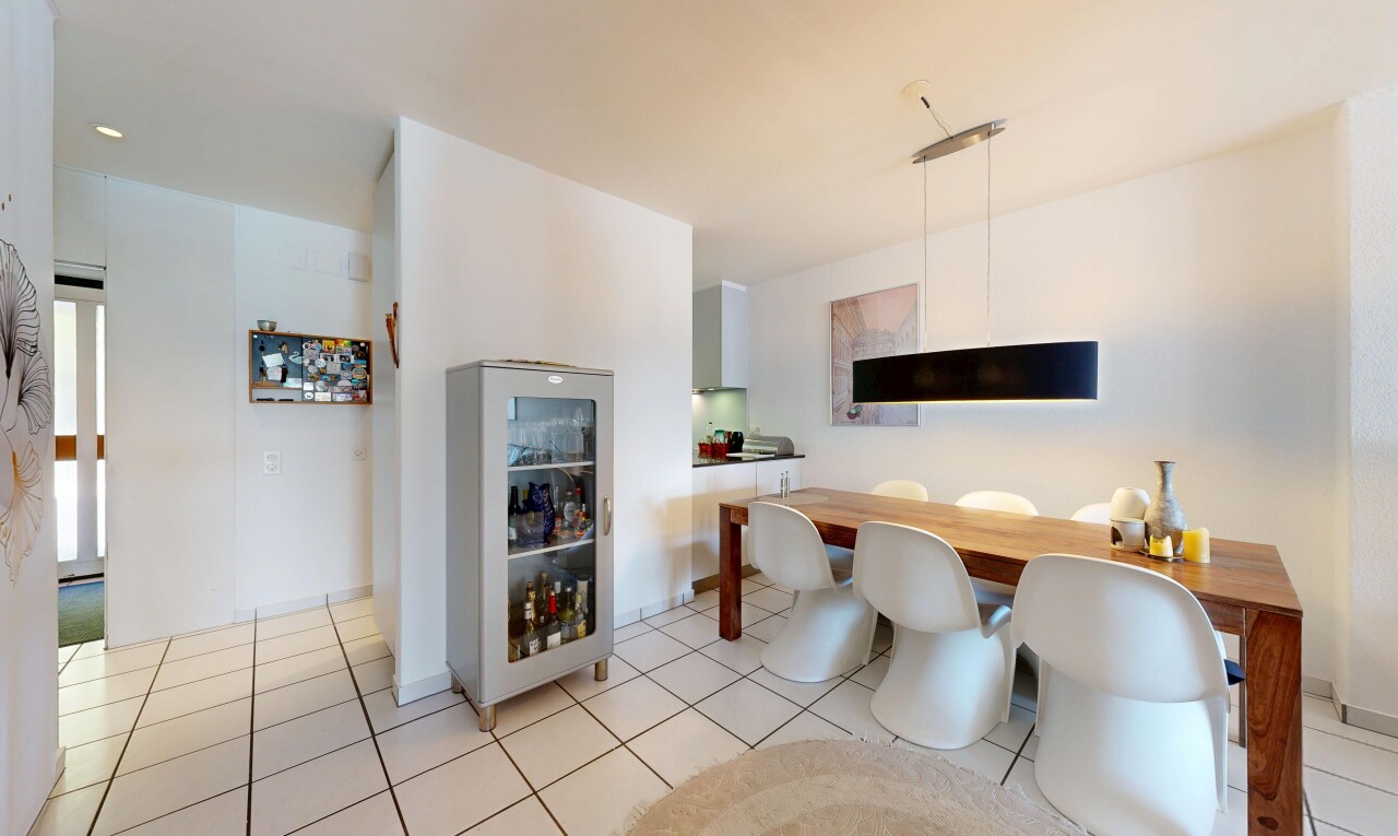 dining area featuring light tile patterned floors