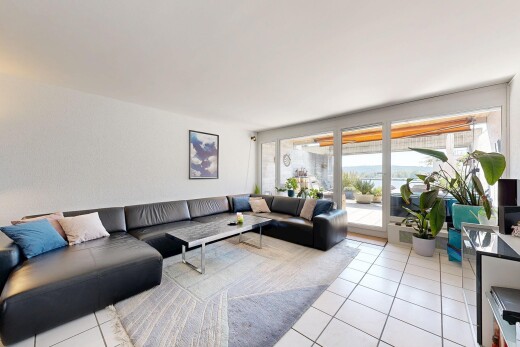living room with light tile patterned floors