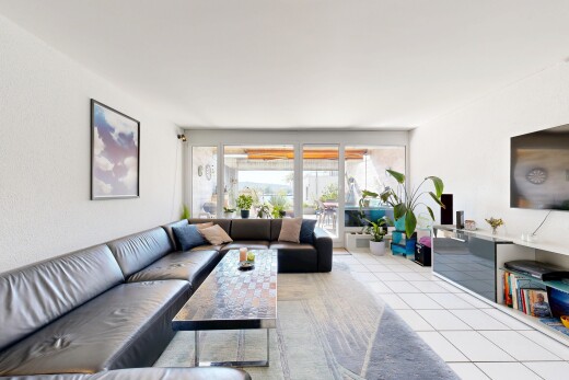 living room featuring light tile patterned flooring