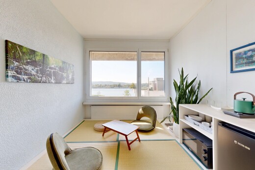 living room featuring a textured wall