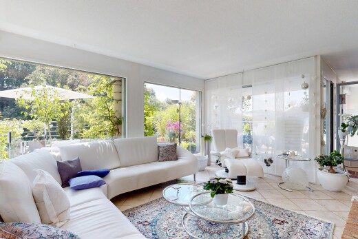 living area with light tile patterned flooring