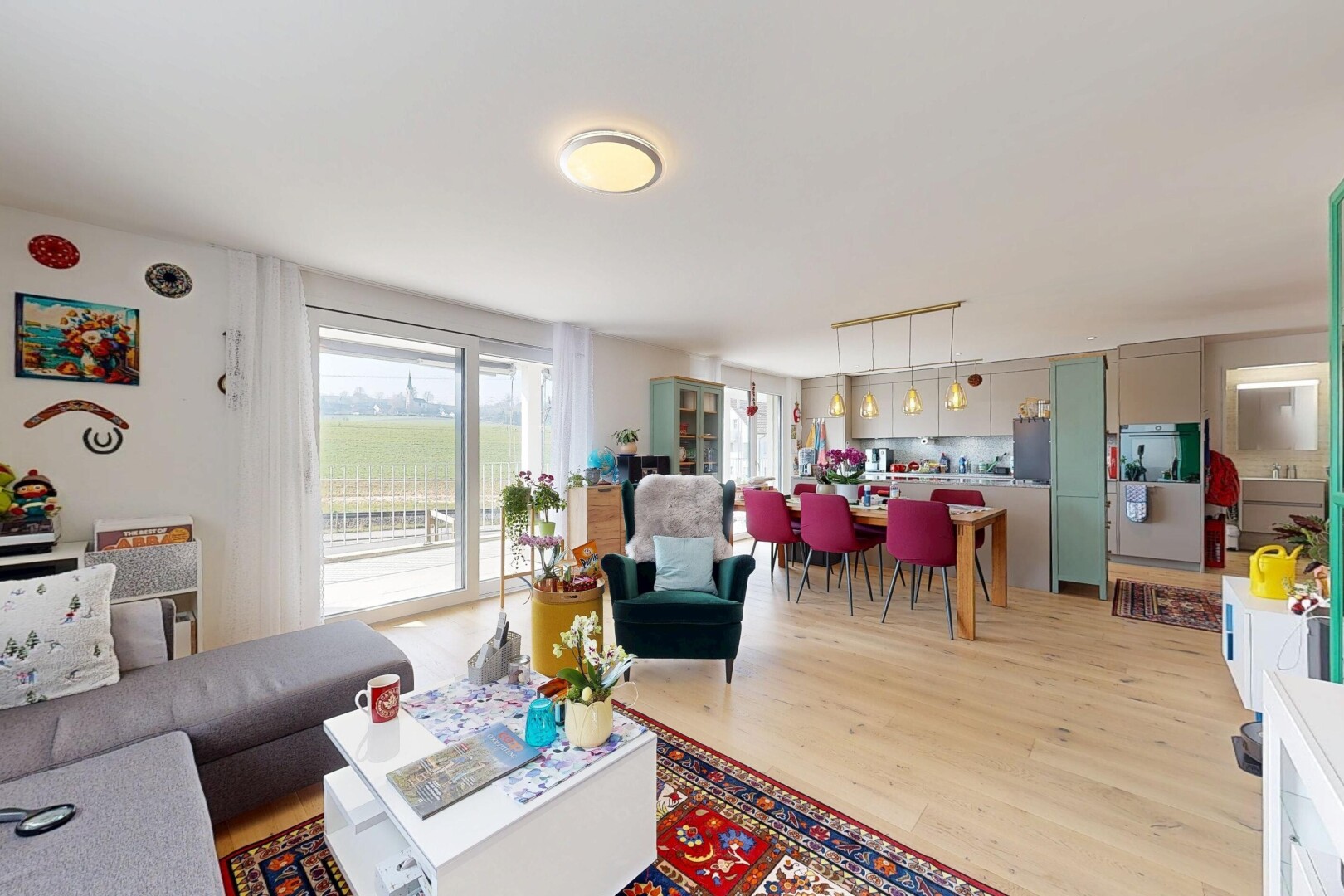 living / dining area featuring light wood-style flooring