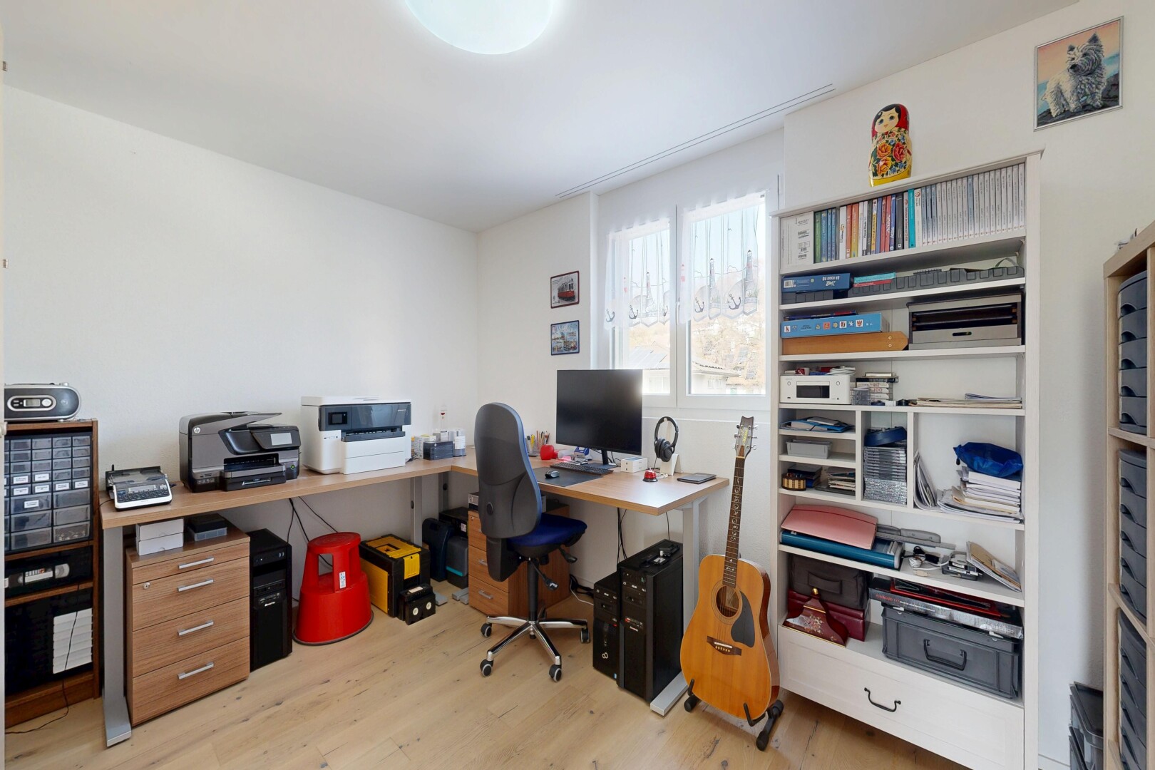 office area featuring light wood finished floors