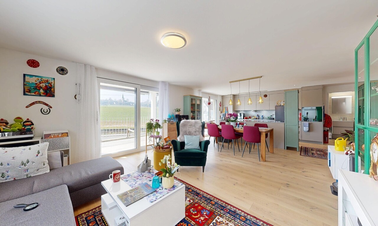 living / dining area featuring light wood-style flooring