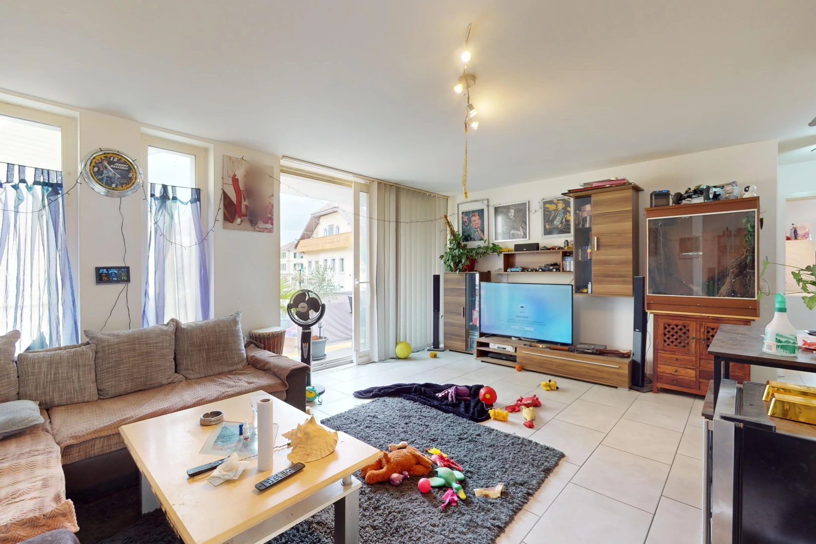living room featuring light tile patterned floors