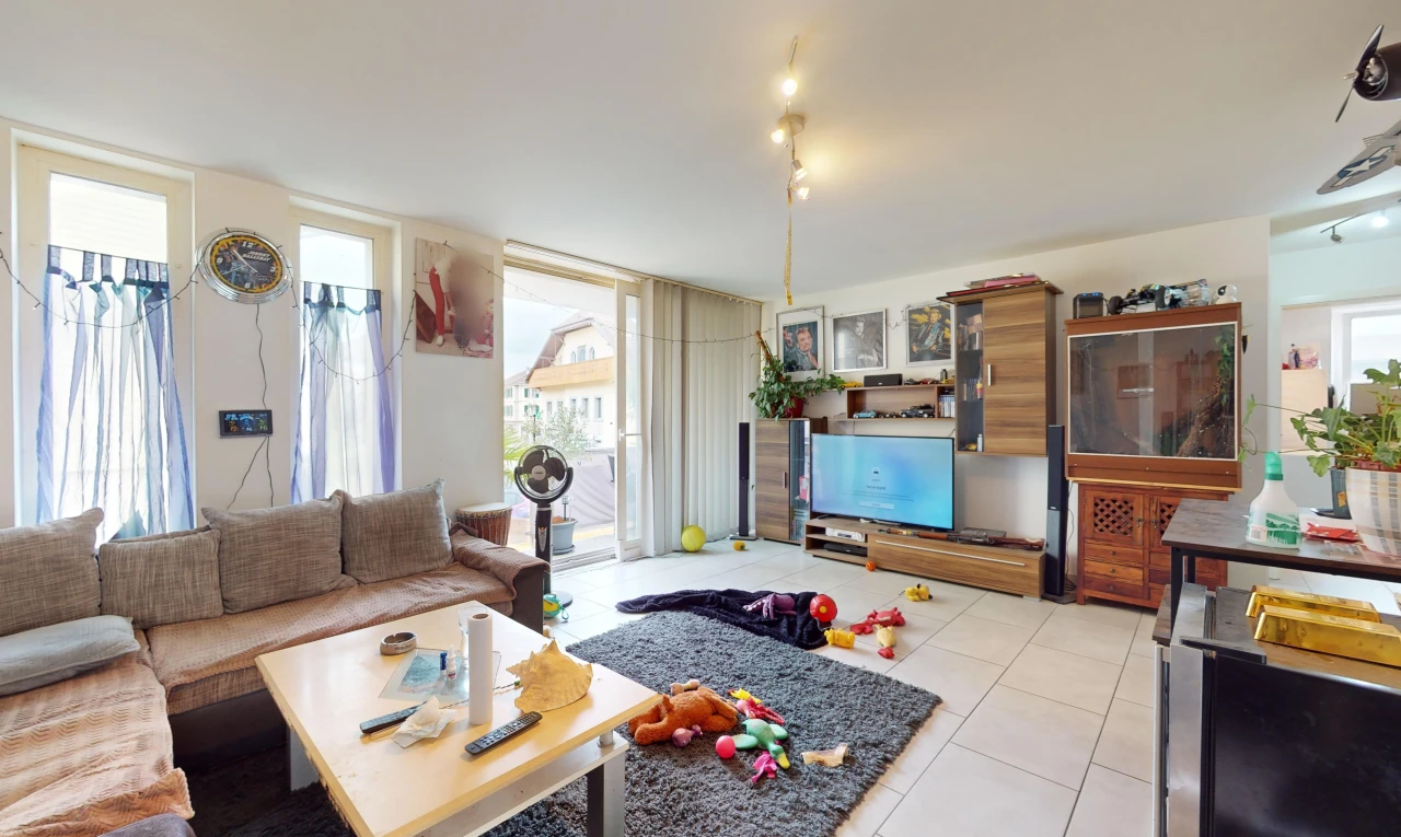 living room featuring light tile patterned floors