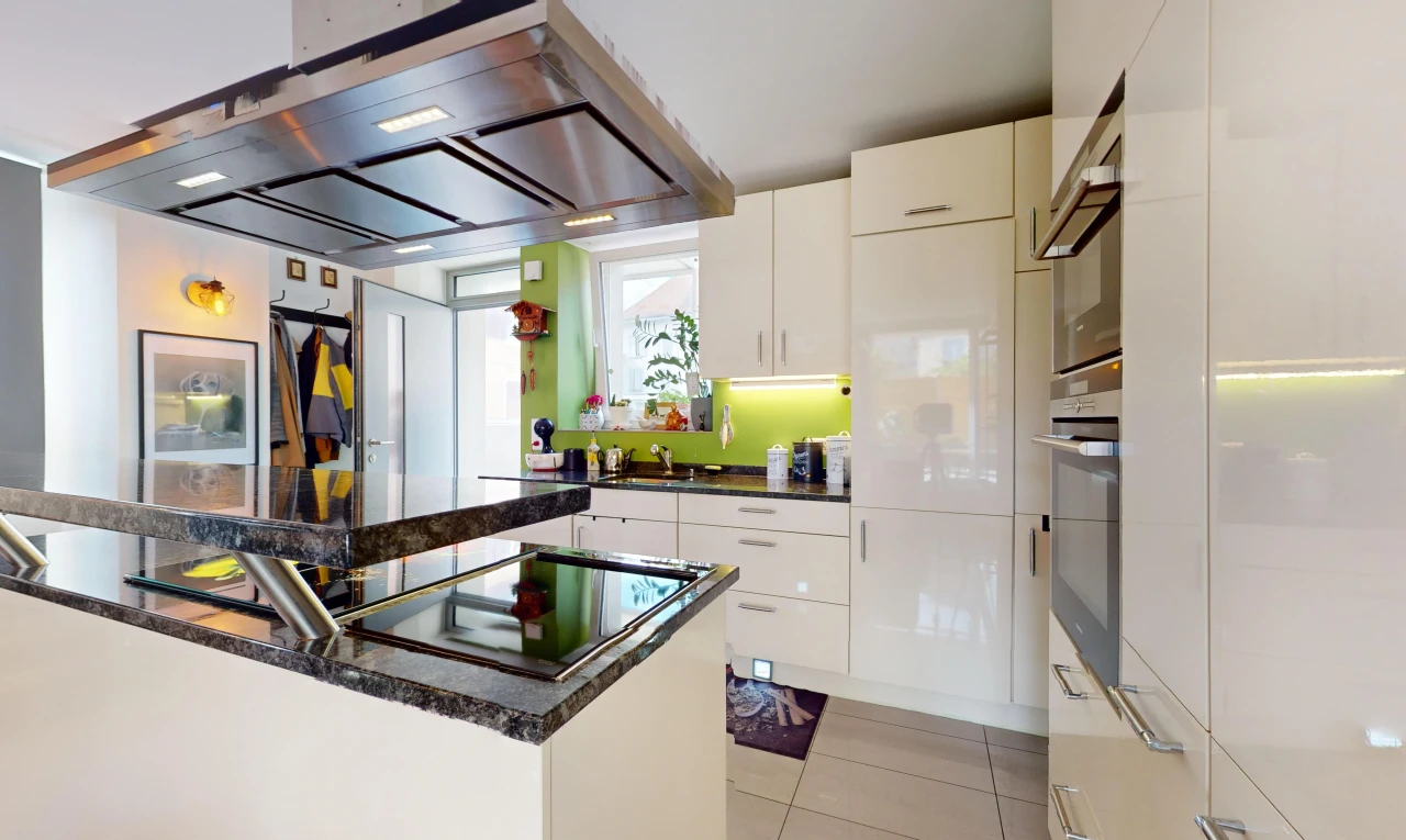 kitchen with white cabinetry, stainless steel oven, light tile patterned floors, and extractor fan