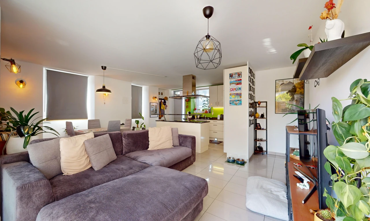 living room with light tile patterned floors