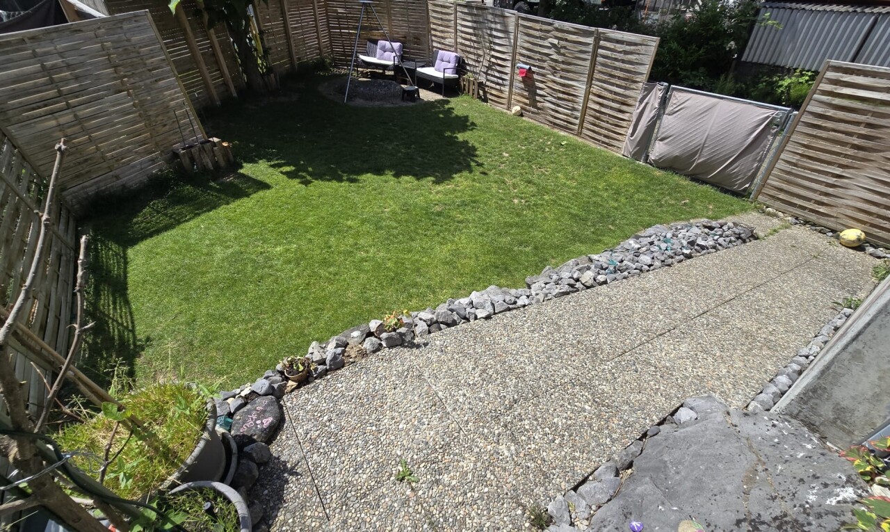 jardin avec clôture, pelouse, et from property