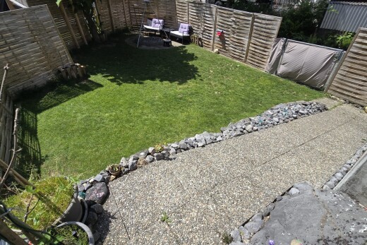jardin avec clôture, pelouse, et from property
