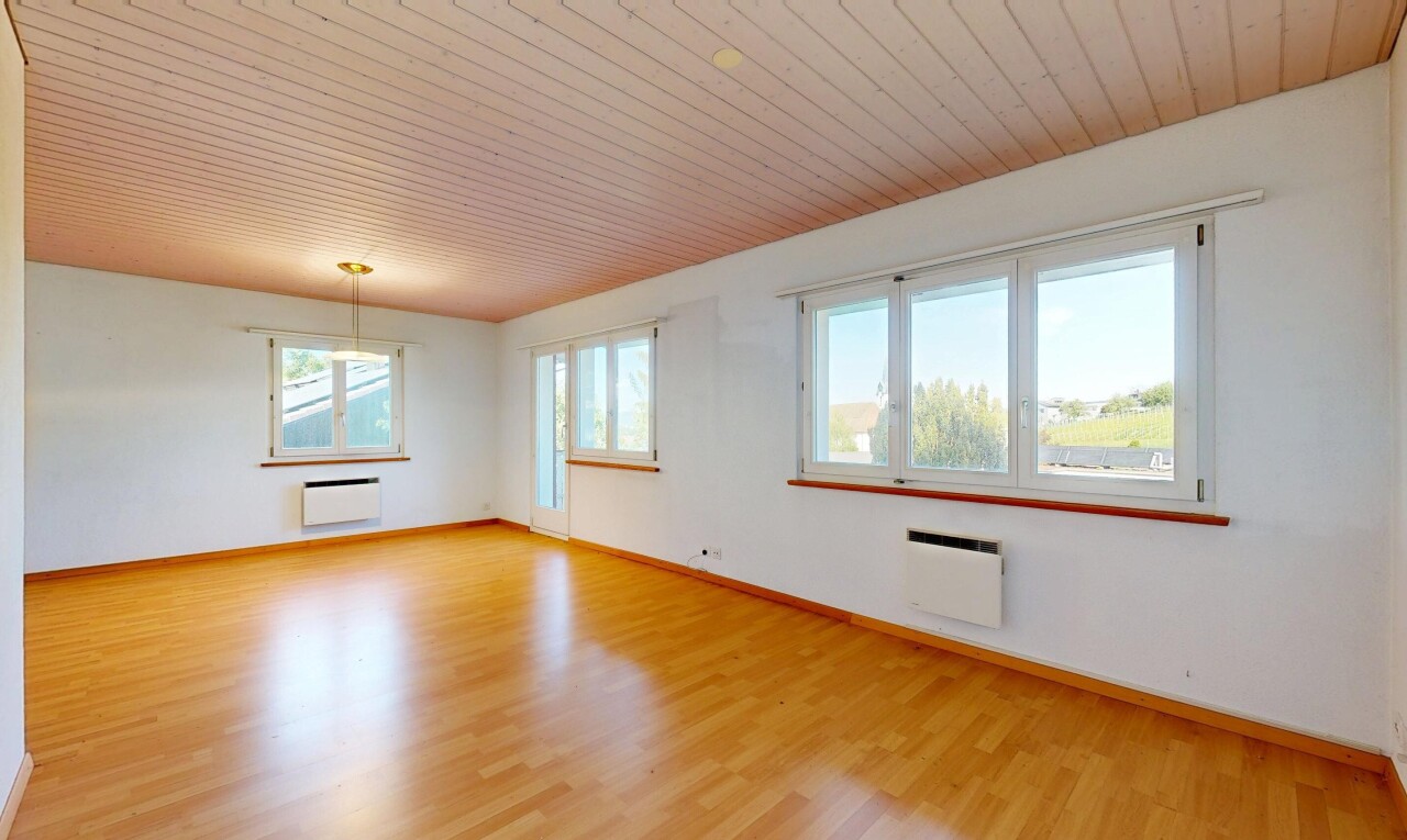 leerer raum mit wood finish floor, holzfußboden, baseboards wall, drywall, und sockelleisten