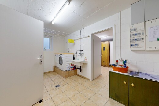buanderie avec inside community, light floor, lave-linge et sèche-linge séparés, drywall, et buanderie