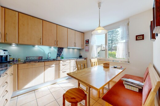 küche mit dark countertops, light floor, hellbraune schränke, light brown cabinets, und inside property