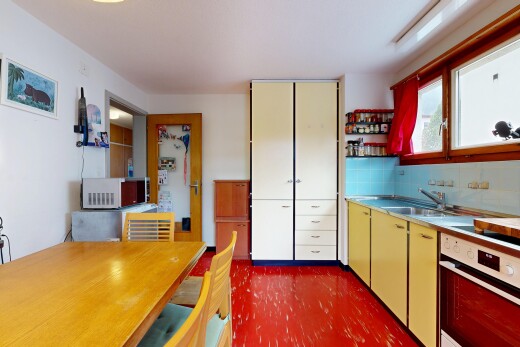 küche mit ofen, inside property, light countertops, arbeitsplatten, und dark floor