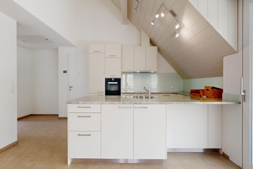 küche mit küchentheke, kitchen peninsula, dachschräge, vaulted ceiling, und light countertops