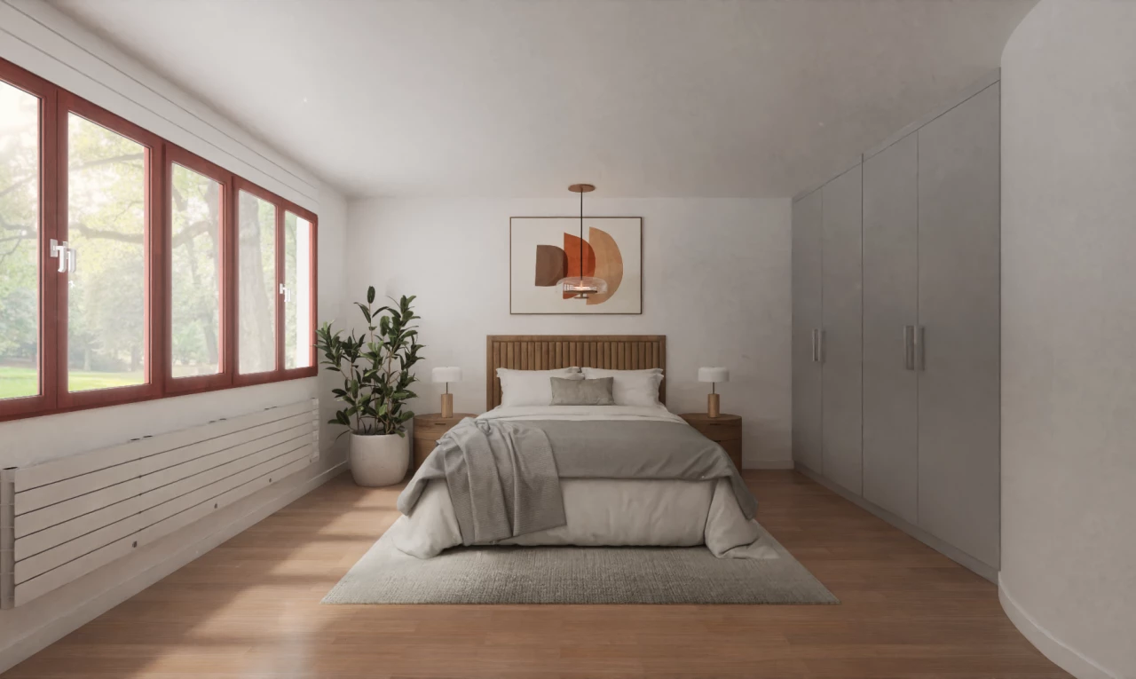 chambre avec lumière naturelle et plancher de bois