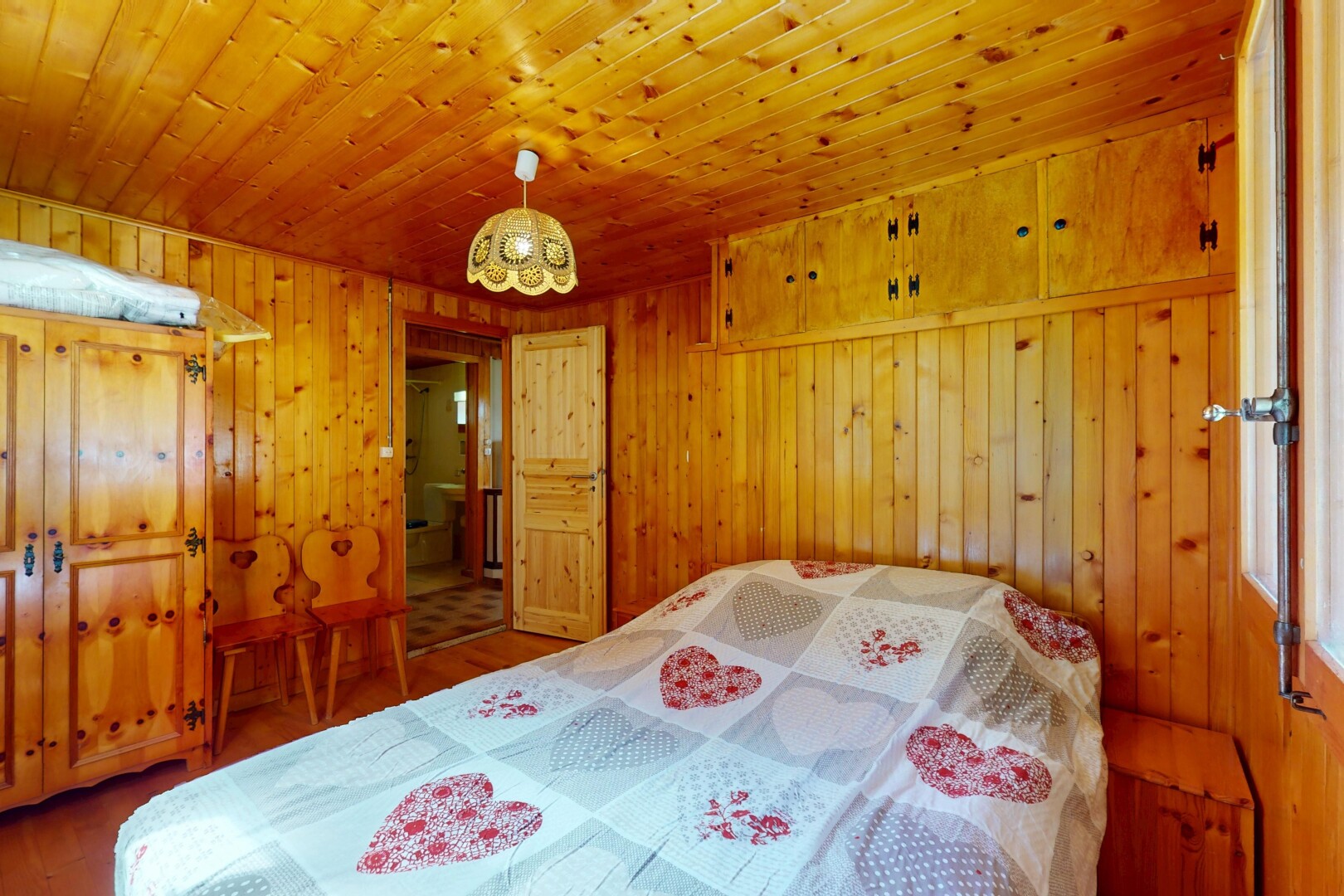 room / bedroom featuring wood finished floors, wood walls, and wood ceiling