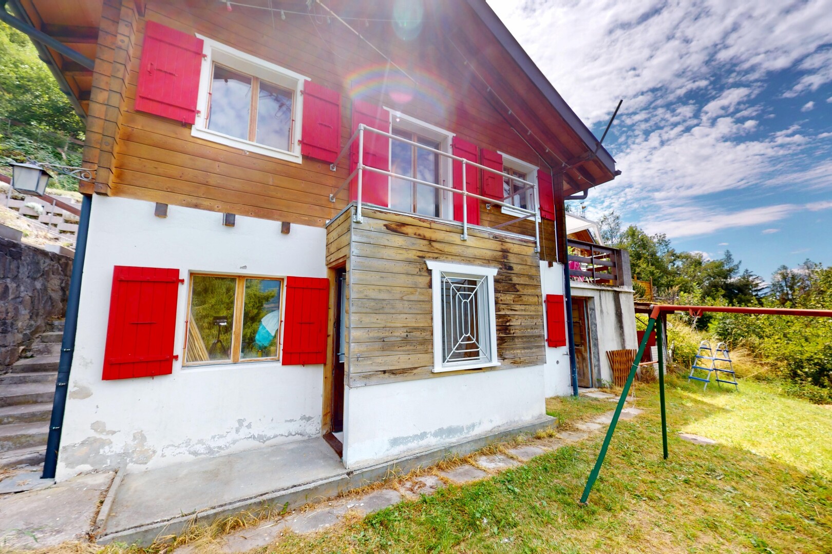 outdoor house with stucco siding