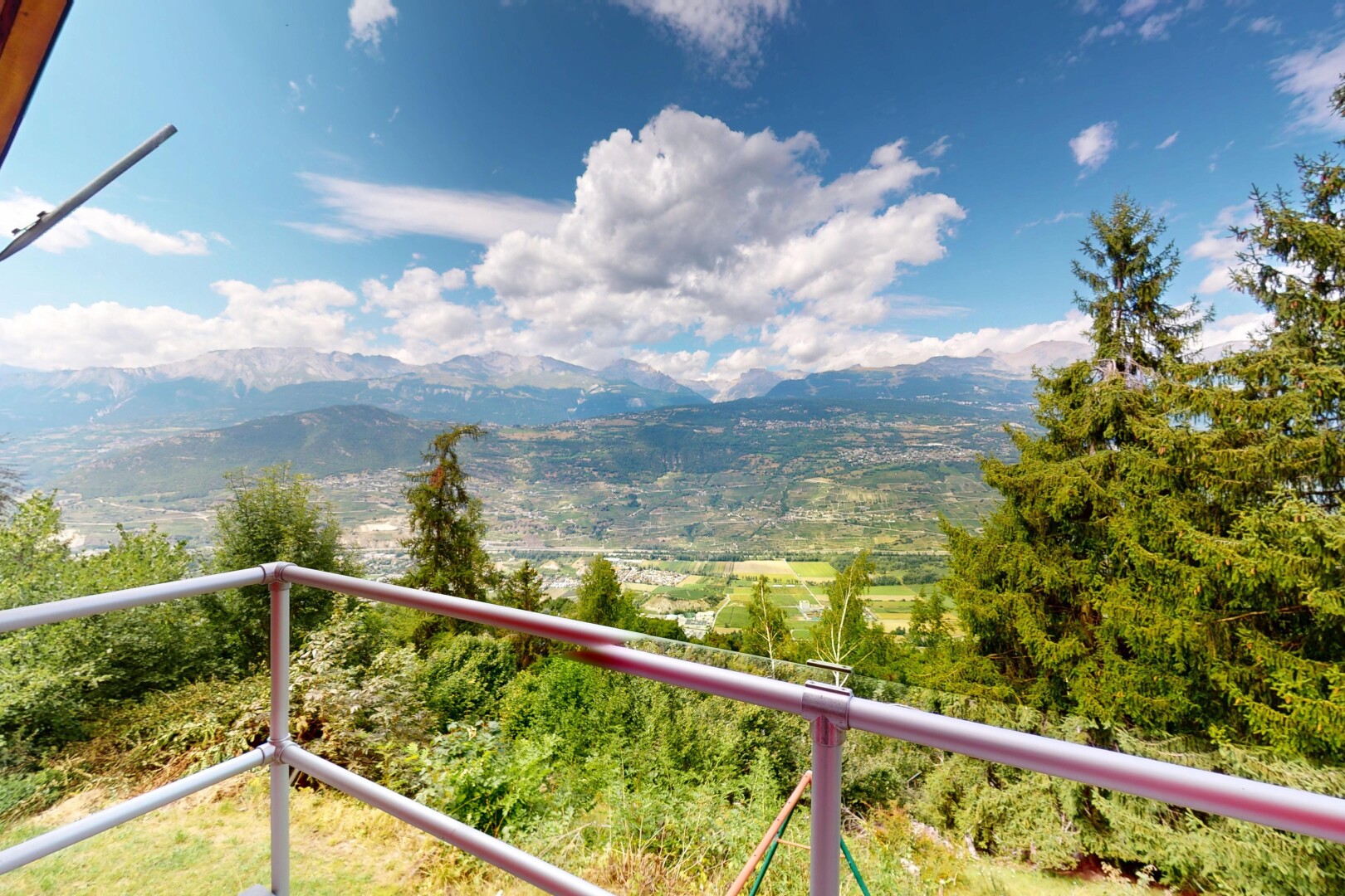 balcony featuring a mountain view