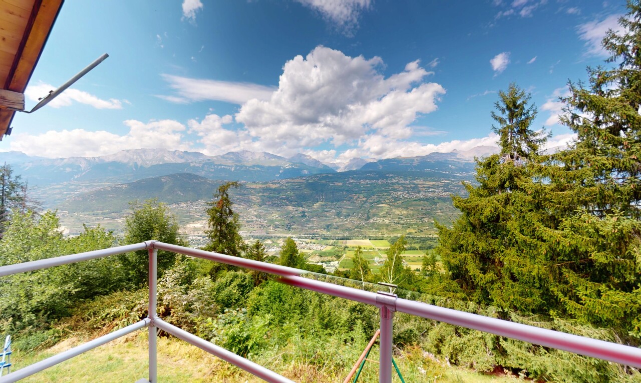 balcony featuring a mountain view