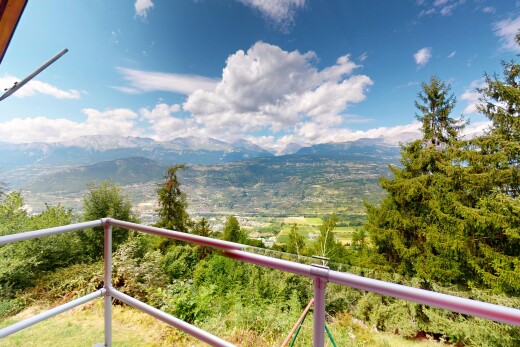 balcony featuring a mountain view