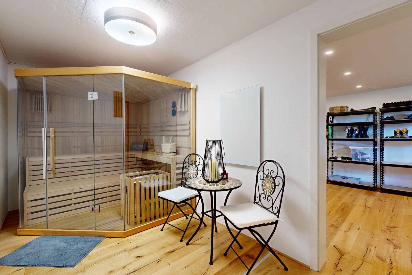 dining room with a sauna / steam room and light wood-style floors