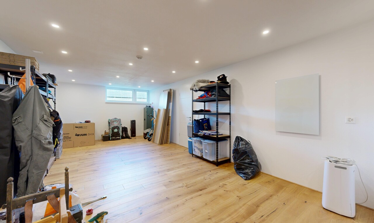 workout area with light wood finished floors