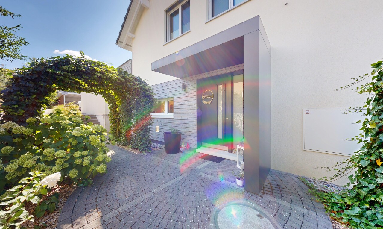 view of home featuring stucco siding