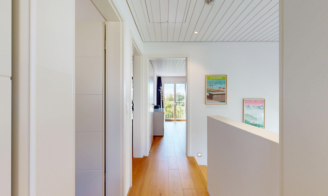 hallway featuring light wood-type flooring, recessed lighting, and wood ceiling