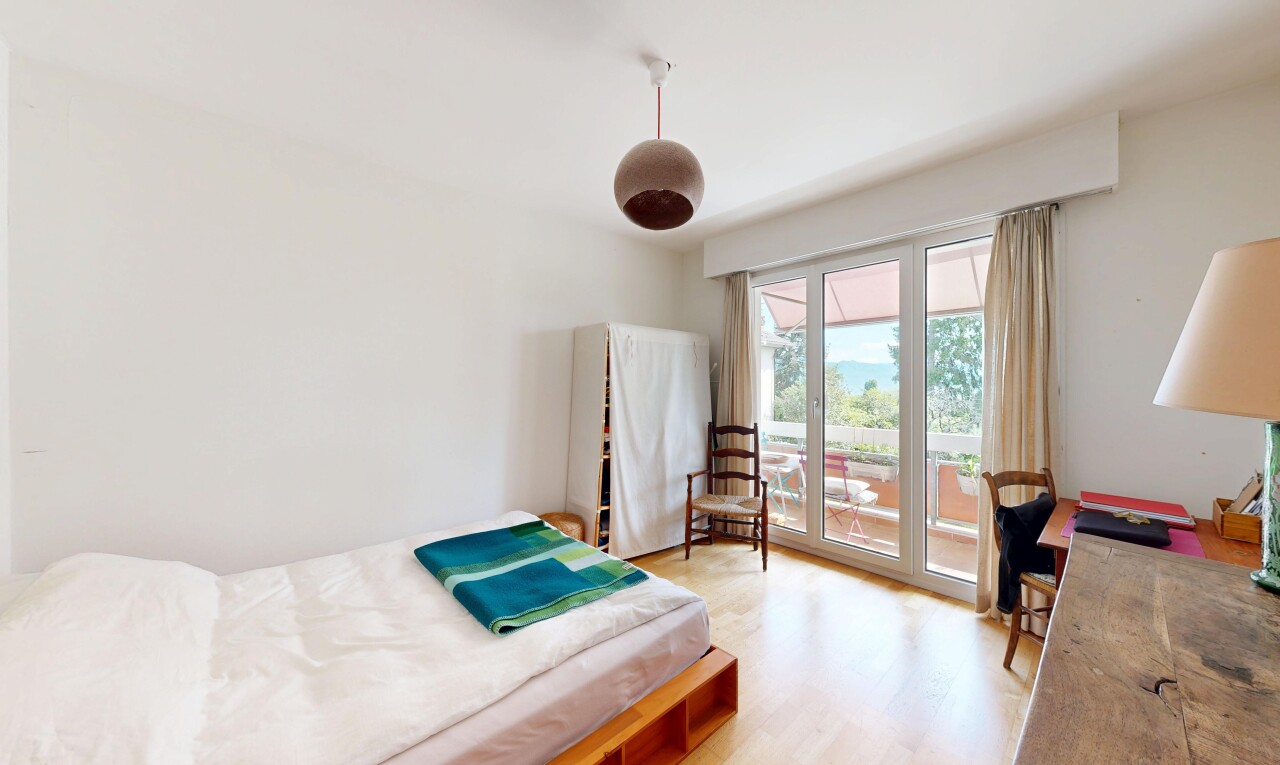room / bedroom with light wood-type flooring, access to exterior, and ceiling fan