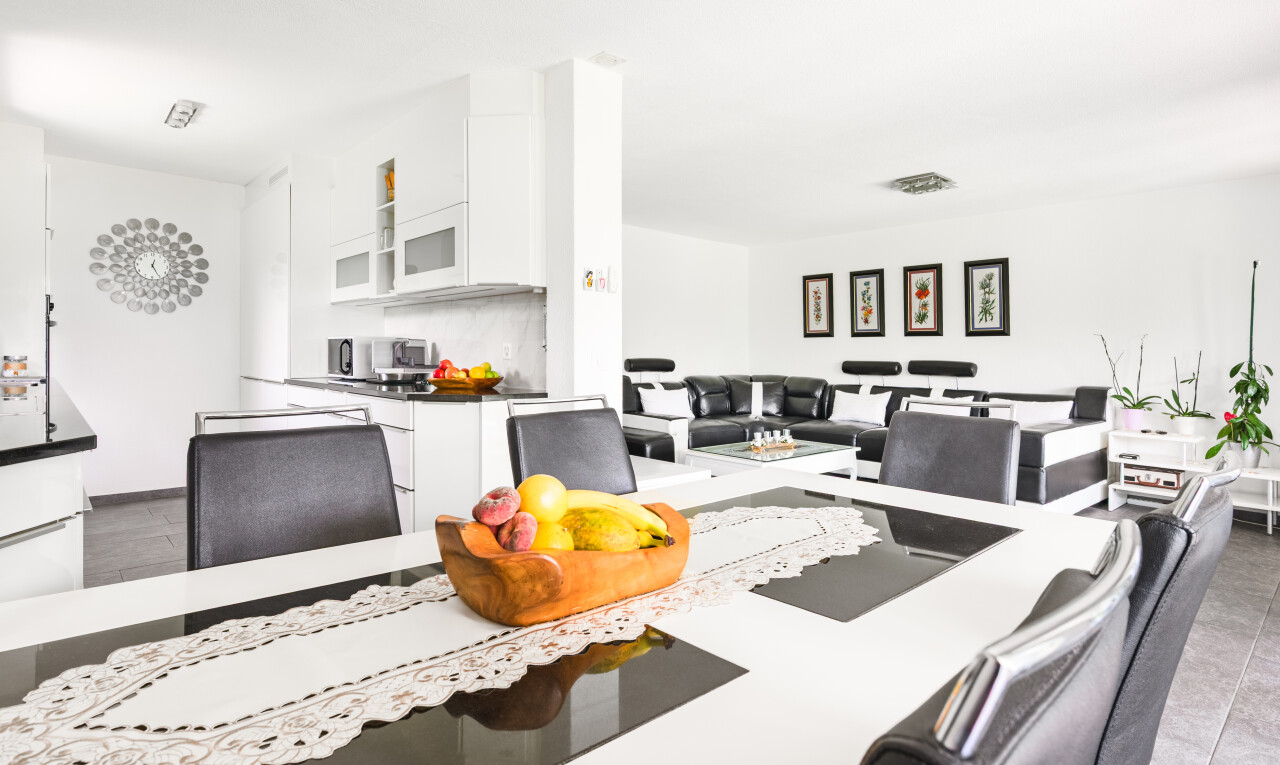 living area featuring light tile patterned floors