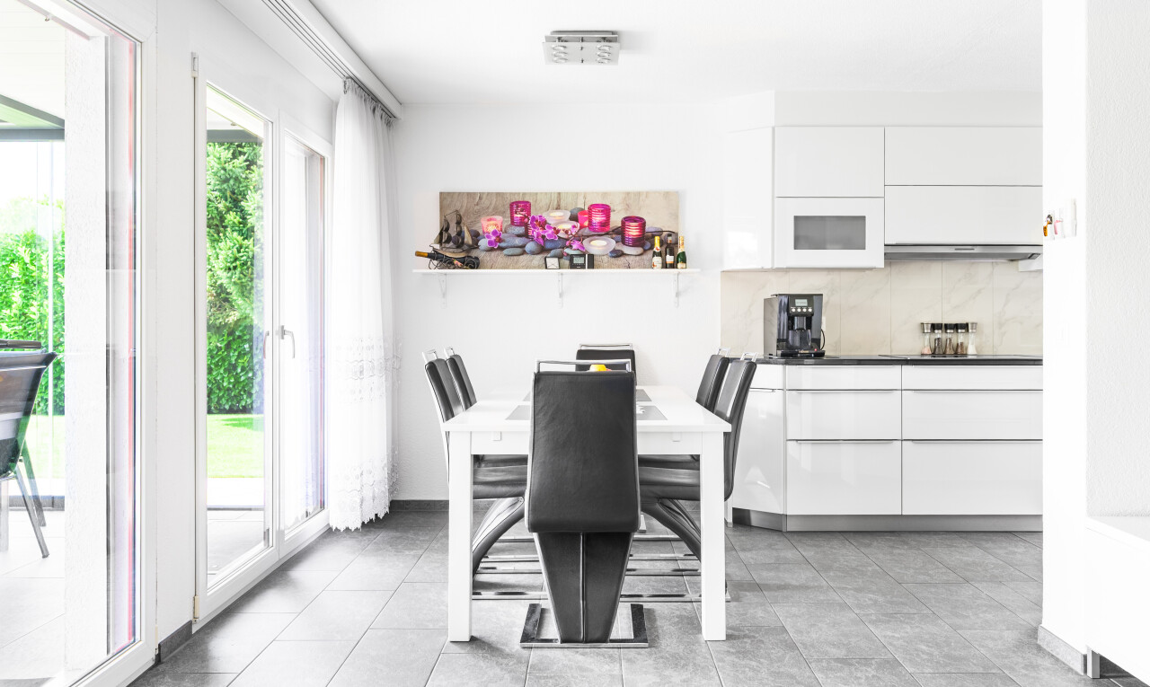 dining area featuring light tile patterned floors