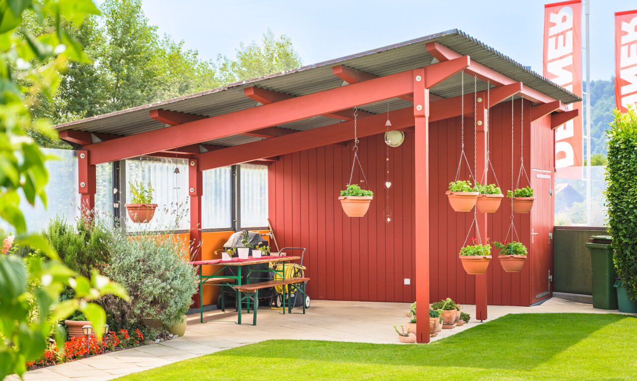 outdoor house featuring a yard and board and batten siding