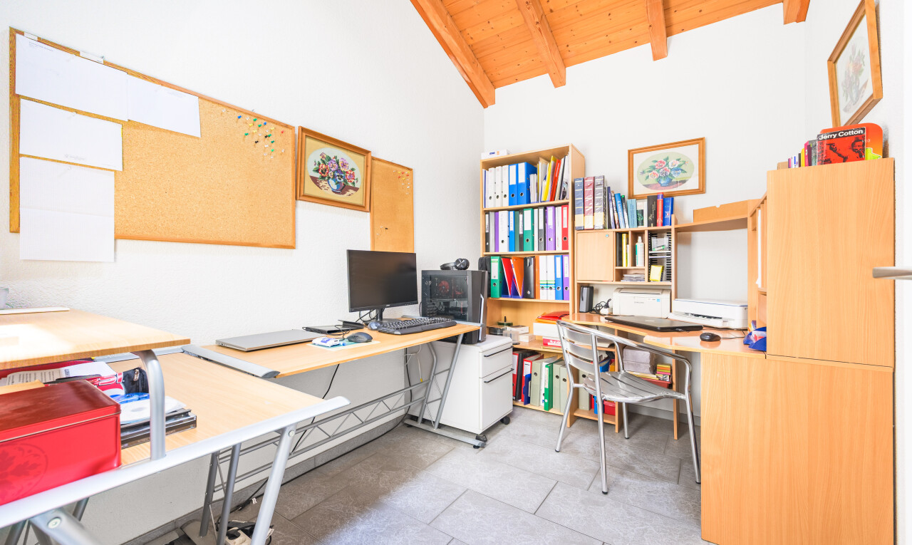 home office with a wood ceiling with exposed beams and high vaulted ceiling
