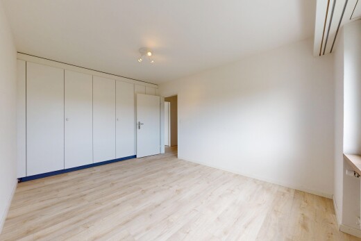 empty room with light wood finished floors