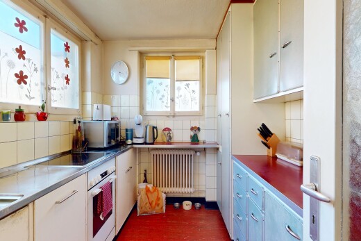 küche mit dark floor, kühler, ofen, inside property, und mikrowelle