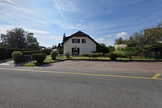 façade avec property visible, day time, et bardage en stuc