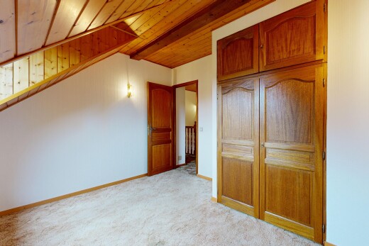 chambre avec inside property, carpet, moquette, drywall, et cloison sèche