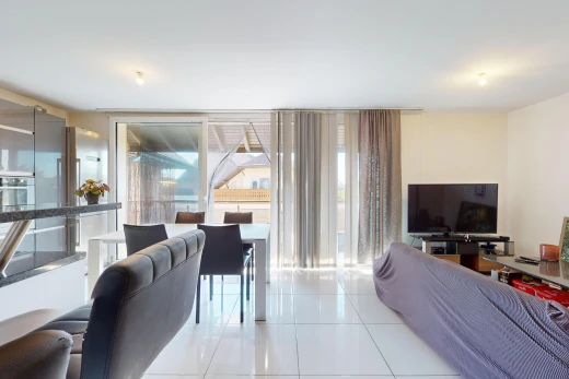 living / dining room featuring light tile patterned floors