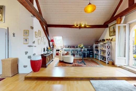 living room featuring hardwood / wood-style flooring, lofted ceiling with beams, and wooden ceiling