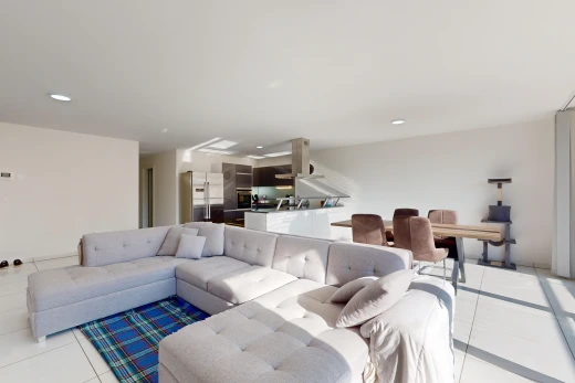 view of tiled living / dining room