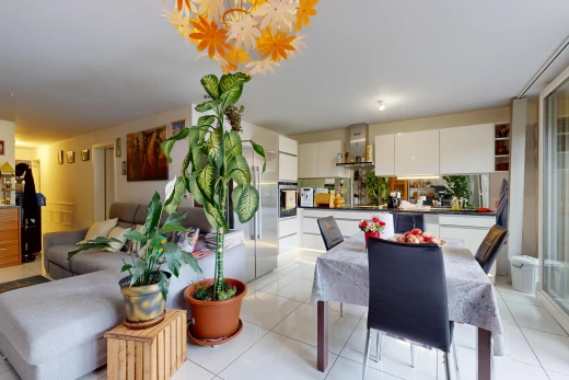 living / dining room featuring light tile patterned floors