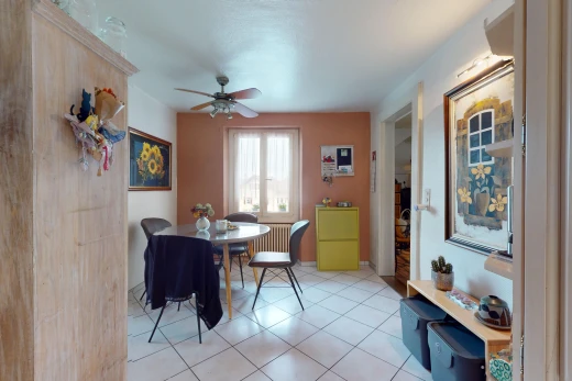 dining room with ceiling fan and light tile patterned floors