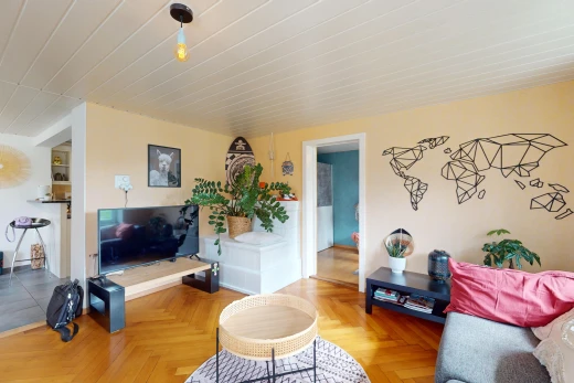 living room featuring parquet floors