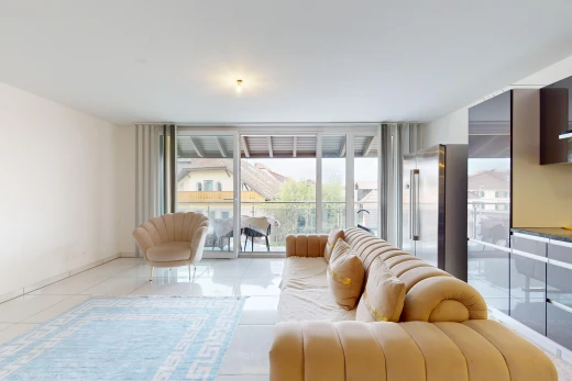 living room featuring floor to ceiling windows and light tile patterned floors