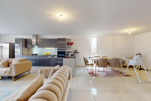 living / dining room with light tile patterned flooring